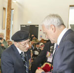 Pat recieves his Legion of Honour from the French Consul